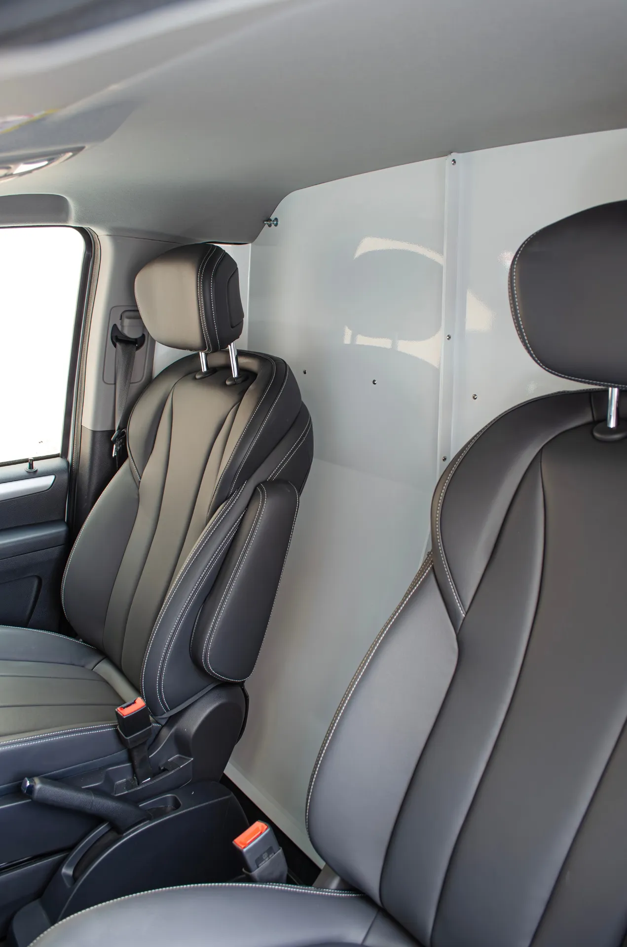 Insulated cab partition — driver and service area separation